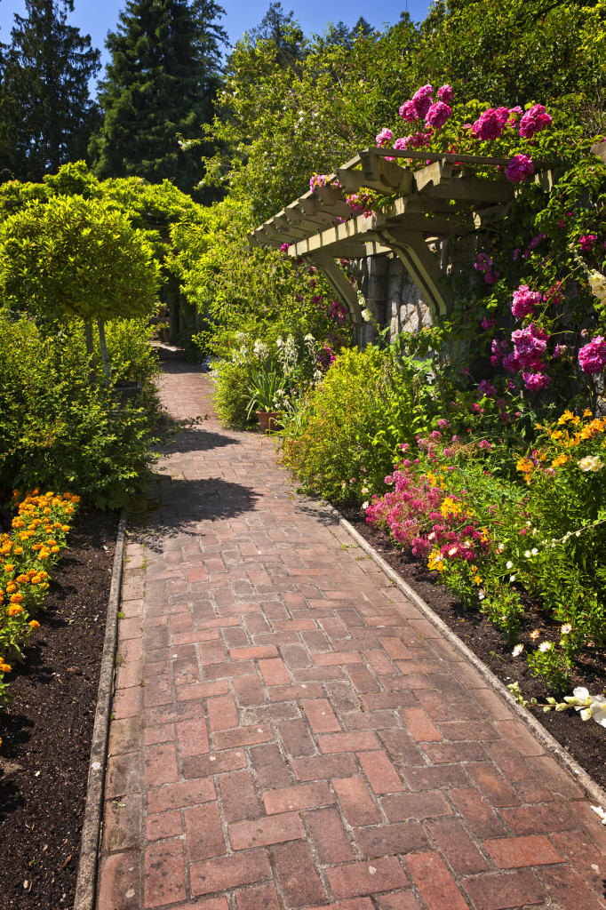 bigstock-Flower-Garden-With-Paved-Path-17817269