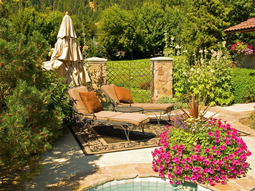 folsom-backyard-hot-tub-hollyhocks-pink-petunia-flowers-fivestar-landscape